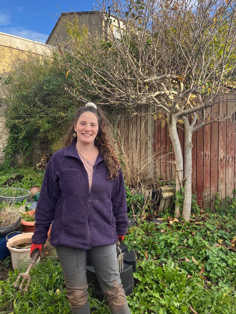 Poppy (writer of the blog) in her garden